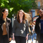 Female Students Walking In Manchester City Centre